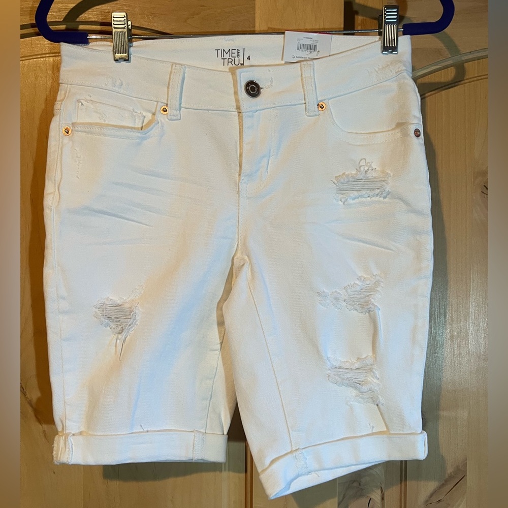 Brand new with tag. Size 4 shirts